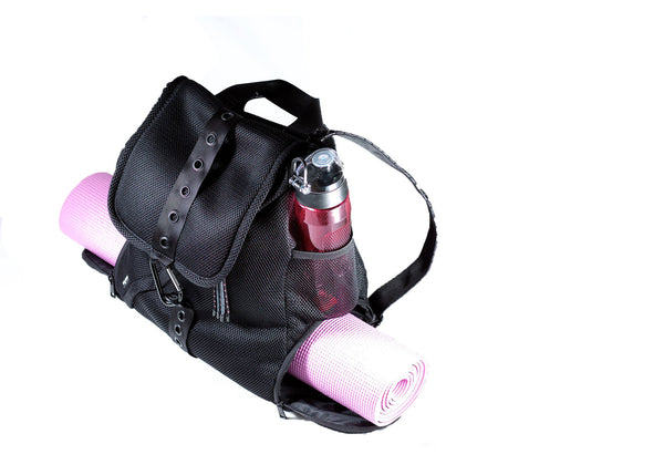 Backpack with the yoga mat and water bottle in exterior mesh pocket. Also great as a baby bag.