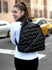 products/round-backpack-puffy-black-lifestyle-1.jpg